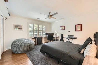Nestled on a spacious meticulously landscaped site in East Cobbs on Atlanta Country Club in Georgia - for sale on GolfHomes.com, golf home, golf lot
