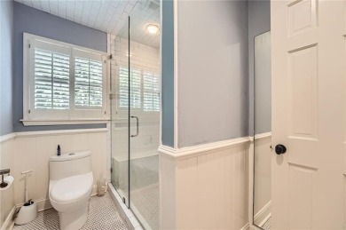 Nestled on a spacious meticulously landscaped site in East Cobbs on Atlanta Country Club in Georgia - for sale on GolfHomes.com, golf home, golf lot