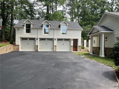 Nestled on a spacious meticulously landscaped site in East Cobbs on Atlanta Country Club in Georgia - for sale on GolfHomes.com, golf home, golf lot