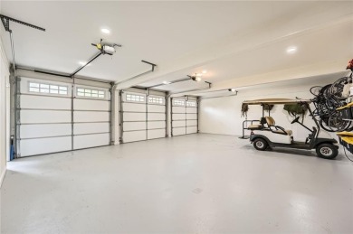 Nestled on a spacious meticulously landscaped site in East Cobbs on Atlanta Country Club in Georgia - for sale on GolfHomes.com, golf home, golf lot