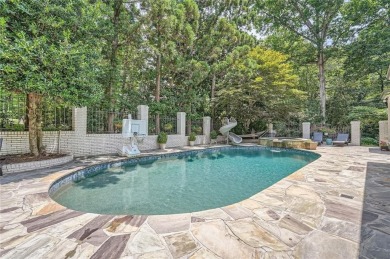 Nestled on a spacious meticulously landscaped site in East Cobbs on Atlanta Country Club in Georgia - for sale on GolfHomes.com, golf home, golf lot