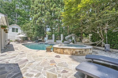 Nestled on a spacious meticulously landscaped site in East Cobbs on Atlanta Country Club in Georgia - for sale on GolfHomes.com, golf home, golf lot