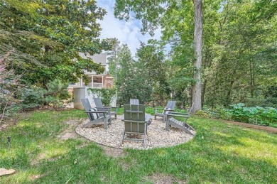 Nestled on a spacious meticulously landscaped site in East Cobbs on Atlanta Country Club in Georgia - for sale on GolfHomes.com, golf home, golf lot