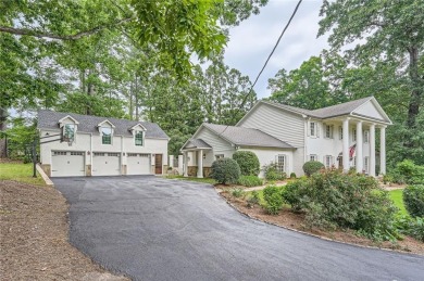 Nestled on a spacious meticulously landscaped site in East Cobbs on Atlanta Country Club in Georgia - for sale on GolfHomes.com, golf home, golf lot
