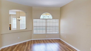 Welcome to this beautifully updated 5-bedroom, 3-bath pool home on The Grand Club - Pine Lakes Course in Florida - for sale on GolfHomes.com, golf home, golf lot