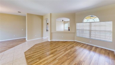 Welcome to this beautifully updated 5-bedroom, 3-bath pool home on The Grand Club - Pine Lakes Course in Florida - for sale on GolfHomes.com, golf home, golf lot