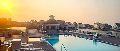 Breathtaking views of the Chincoteague Bay, a front row seat to on Captains Cove Golf and Yacht Club in Virginia - for sale on GolfHomes.com, golf home, golf lot