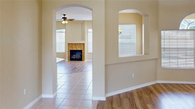 Welcome to this beautifully updated 5-bedroom, 3-bath pool home on The Grand Club - Pine Lakes Course in Florida - for sale on GolfHomes.com, golf home, golf lot