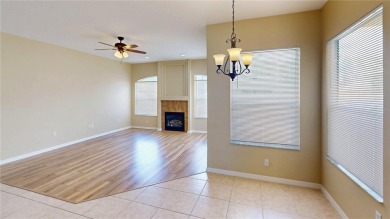 Welcome to this beautifully updated 5-bedroom, 3-bath pool home on The Grand Club - Pine Lakes Course in Florida - for sale on GolfHomes.com, golf home, golf lot