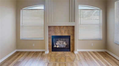 Welcome to this beautifully updated 5-bedroom, 3-bath pool home on The Grand Club - Pine Lakes Course in Florida - for sale on GolfHomes.com, golf home, golf lot