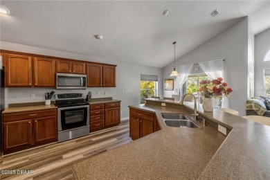 Welcome to 225 Perfect! This beautifully updated pool home is on LPGA International Golf Course in Florida - for sale on GolfHomes.com, golf home, golf lot