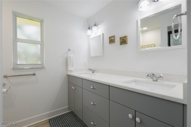 Stunning fully renovated 3BR/2BA ground-level home with private on Beachview Golf Club in Florida - for sale on GolfHomes.com, golf home, golf lot