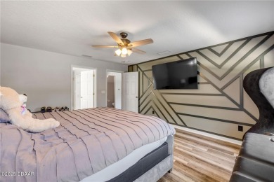 Welcome to 225 Perfect! This beautifully updated pool home is on LPGA International Golf Course in Florida - for sale on GolfHomes.com, golf home, golf lot