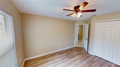 Welcome to this beautifully updated 5-bedroom, 3-bath pool home on The Grand Club - Pine Lakes Course in Florida - for sale on GolfHomes.com, golf home, golf lot