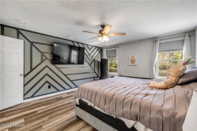 Welcome to 225 Perfect! This beautifully updated pool home is on LPGA International Golf Course in Florida - for sale on GolfHomes.com, golf home, golf lot