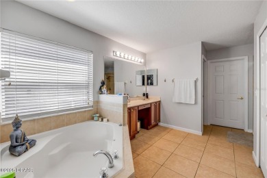 Welcome to 225 Perfect! This beautifully updated pool home is on LPGA International Golf Course in Florida - for sale on GolfHomes.com, golf home, golf lot
