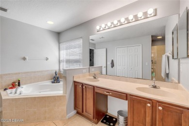 Welcome to 225 Perfect! This beautifully updated pool home is on LPGA International Golf Course in Florida - for sale on GolfHomes.com, golf home, golf lot