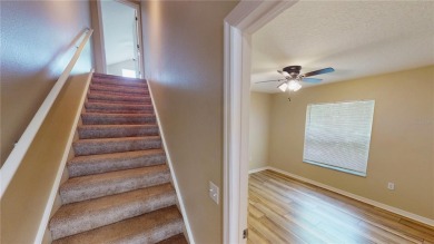 Welcome to this beautifully updated 5-bedroom, 3-bath pool home on The Grand Club - Pine Lakes Course in Florida - for sale on GolfHomes.com, golf home, golf lot