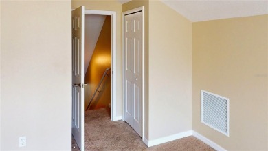 Welcome to this beautifully updated 5-bedroom, 3-bath pool home on The Grand Club - Pine Lakes Course in Florida - for sale on GolfHomes.com, golf home, golf lot