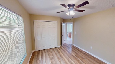 Welcome to this beautifully updated 5-bedroom, 3-bath pool home on The Grand Club - Pine Lakes Course in Florida - for sale on GolfHomes.com, golf home, golf lot