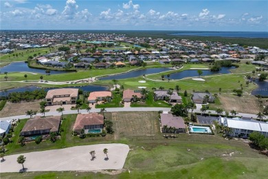 Oversized lot on quiet street with unique view of the 10th on Saint Andrews South Golf Club in Florida - for sale on GolfHomes.com, golf home, golf lot