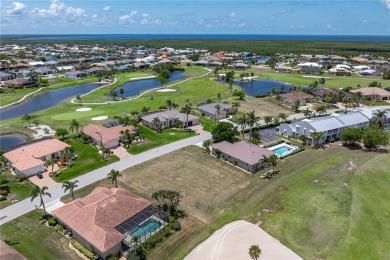Oversized lot on quiet street with unique view of the 10th on Saint Andrews South Golf Club in Florida - for sale on GolfHomes.com, golf home, golf lot