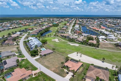 Oversized lot on quiet street with unique view of the 10th on Saint Andrews South Golf Club in Florida - for sale on GolfHomes.com, golf home, golf lot