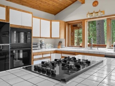 Welcome to your cabin in the woods with valley views. This 3 on Whitehawk Ranch Golf Club in California - for sale on GolfHomes.com, golf home, golf lot