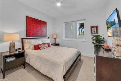 In a lush, tropical oasis, this second-floor resort-style on The Colony Golf and Country Club in Florida - for sale on GolfHomes.com, golf home, golf lot