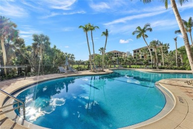 In a lush, tropical oasis, this second-floor resort-style on The Colony Golf and Country Club in Florida - for sale on GolfHomes.com, golf home, golf lot