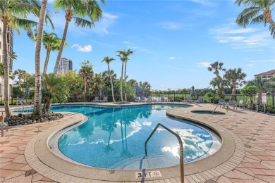 In a lush, tropical oasis, this second-floor resort-style on The Colony Golf and Country Club in Florida - for sale on GolfHomes.com, golf home, golf lot