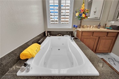 Elevated living in a beautifully appointed residence within a on Reflection Bay Golf Club in Nevada - for sale on GolfHomes.com, golf home, golf lot