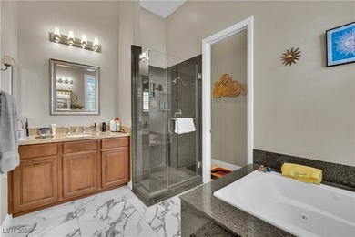 Elevated living in a beautifully appointed residence within a on Reflection Bay Golf Club in Nevada - for sale on GolfHomes.com, golf home, golf lot