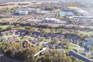 Located in the desirable Seven Springs Golf & Country Club on Seven Springs Golf and Country Club in Florida - for sale on GolfHomes.com, golf home, golf lot