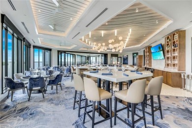 In a lush, tropical oasis, this second-floor resort-style on The Colony Golf and Country Club in Florida - for sale on GolfHomes.com, golf home, golf lot