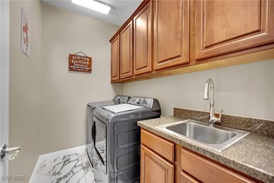 Elevated living in a beautifully appointed residence within a on Reflection Bay Golf Club in Nevada - for sale on GolfHomes.com, golf home, golf lot