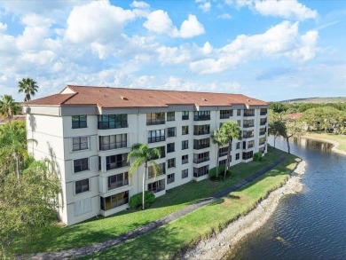 All hurricane impact windows, new A/C, hot water heater (2023) on Wynmoor Golf Course in Florida - for sale on GolfHomes.com, golf home, golf lot