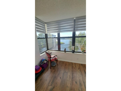 All hurricane impact windows, new A/C, hot water heater (2023) on Wynmoor Golf Course in Florida - for sale on GolfHomes.com, golf home, golf lot