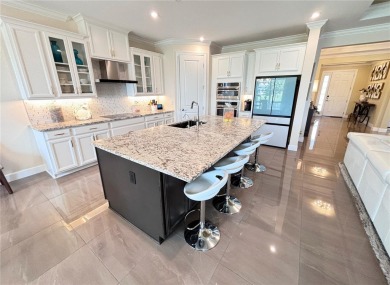 Under contract-accepting backup offers. STUNNING Dolcetto model on Stonegate Golf Club in Florida - for sale on GolfHomes.com, golf home, golf lot