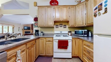 This 2-bedroom, 3-bathroom home is located in Country Club on Headwaters Country Club in Minnesota - for sale on GolfHomes.com, golf home, golf lot