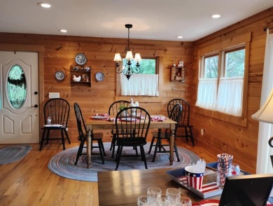 The most adorable, all wood, cabin with a magnificent view in on Sky Valley Resort and Country Club in Georgia - for sale on GolfHomes.com, golf home, golf lot