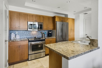 This bright two-bed, two-bath condo sits in an unbeatable on Desert Island Golf and Country Club in California - for sale on GolfHomes.com, golf home, golf lot