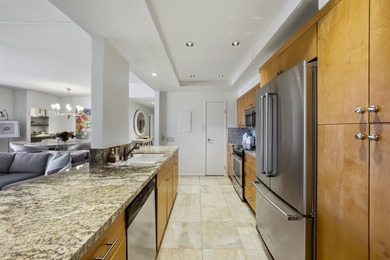 This bright two-bed, two-bath condo sits in an unbeatable on Desert Island Golf and Country Club in California - for sale on GolfHomes.com, golf home, golf lot