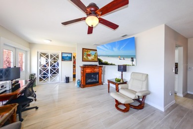 COMPLETELY REMODELED AND UPDATED 3/2/2 SAILBOAT WATER POOL HOME on Saint Andrews South Golf Club in Florida - for sale on GolfHomes.com, golf home, golf lot