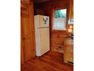 The most adorable, all wood, cabin with a magnificent view in on Sky Valley Resort and Country Club in Georgia - for sale on GolfHomes.com, golf home, golf lot