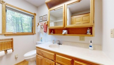 This 2-bedroom, 3-bathroom home is located in Country Club on Headwaters Country Club in Minnesota - for sale on GolfHomes.com, golf home, golf lot