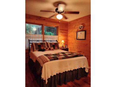 The most adorable, all wood, cabin with a magnificent view in on Sky Valley Resort and Country Club in Georgia - for sale on GolfHomes.com, golf home, golf lot