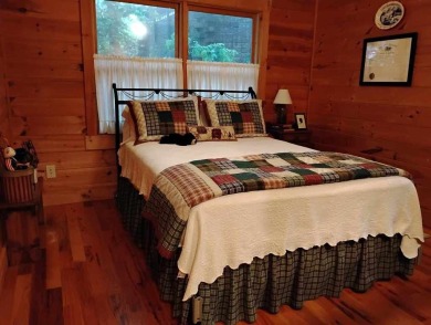 The most adorable, all wood, cabin with a magnificent view in on Sky Valley Resort and Country Club in Georgia - for sale on GolfHomes.com, golf home, golf lot
