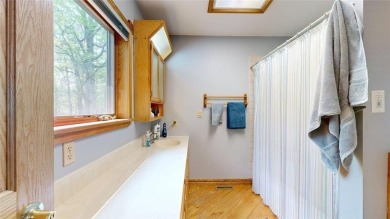 This 2-bedroom, 3-bathroom home is located in Country Club on Headwaters Country Club in Minnesota - for sale on GolfHomes.com, golf home, golf lot