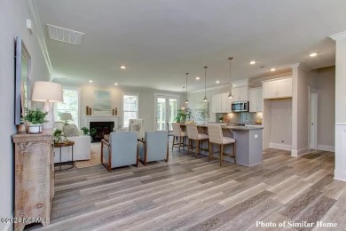 Experience timeless design and modern comfort in the Midland II on Green Hills Golf Course in North Carolina - for sale on GolfHomes.com, golf home, golf lot
